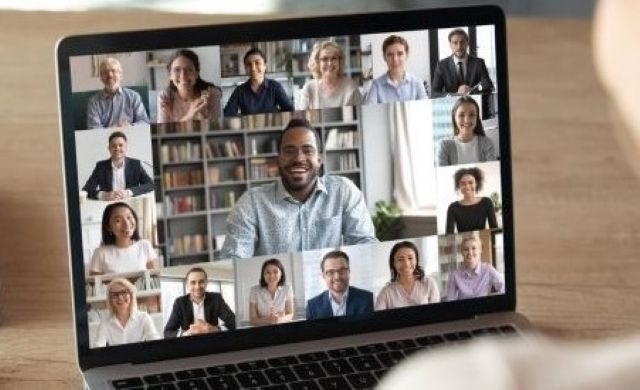 Two women eagerly listen